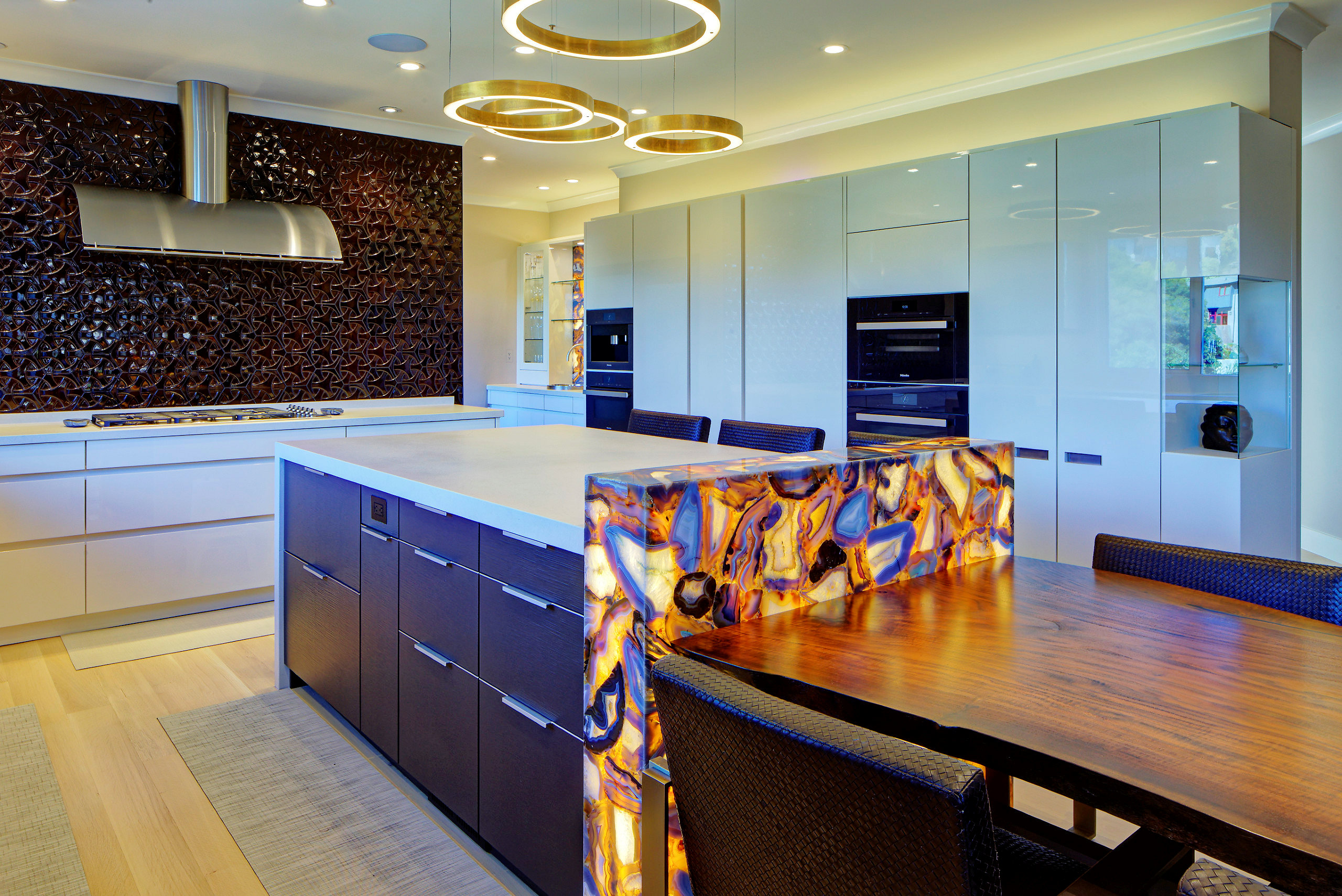 Modern Oakland Hills kitchen with high-end island, integrated appliances, and upgraded finishes for turnkey property appeal.