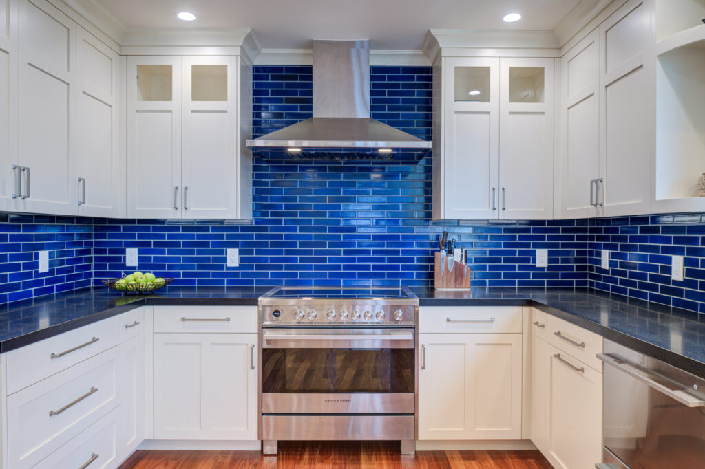 Modern Oakland kitchen featuring updated appliances, renovated cabinetry, durable work surfaces, and recently installed flooring.