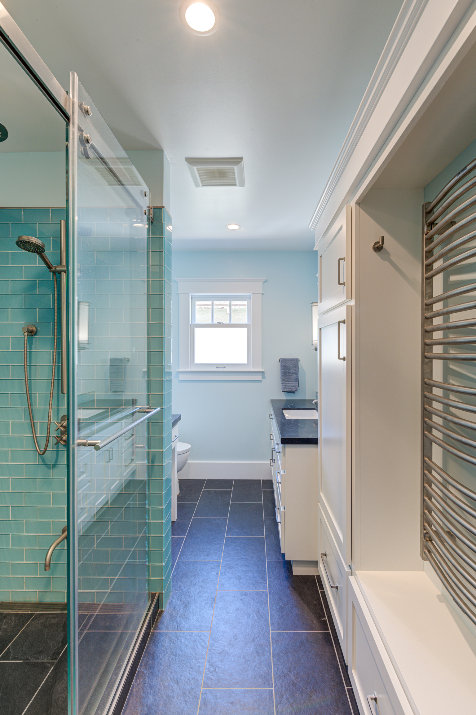 Contemporary bathroom featuring updated shower, efficient layout, energy-saving window, and quality fixtures for lasting value.