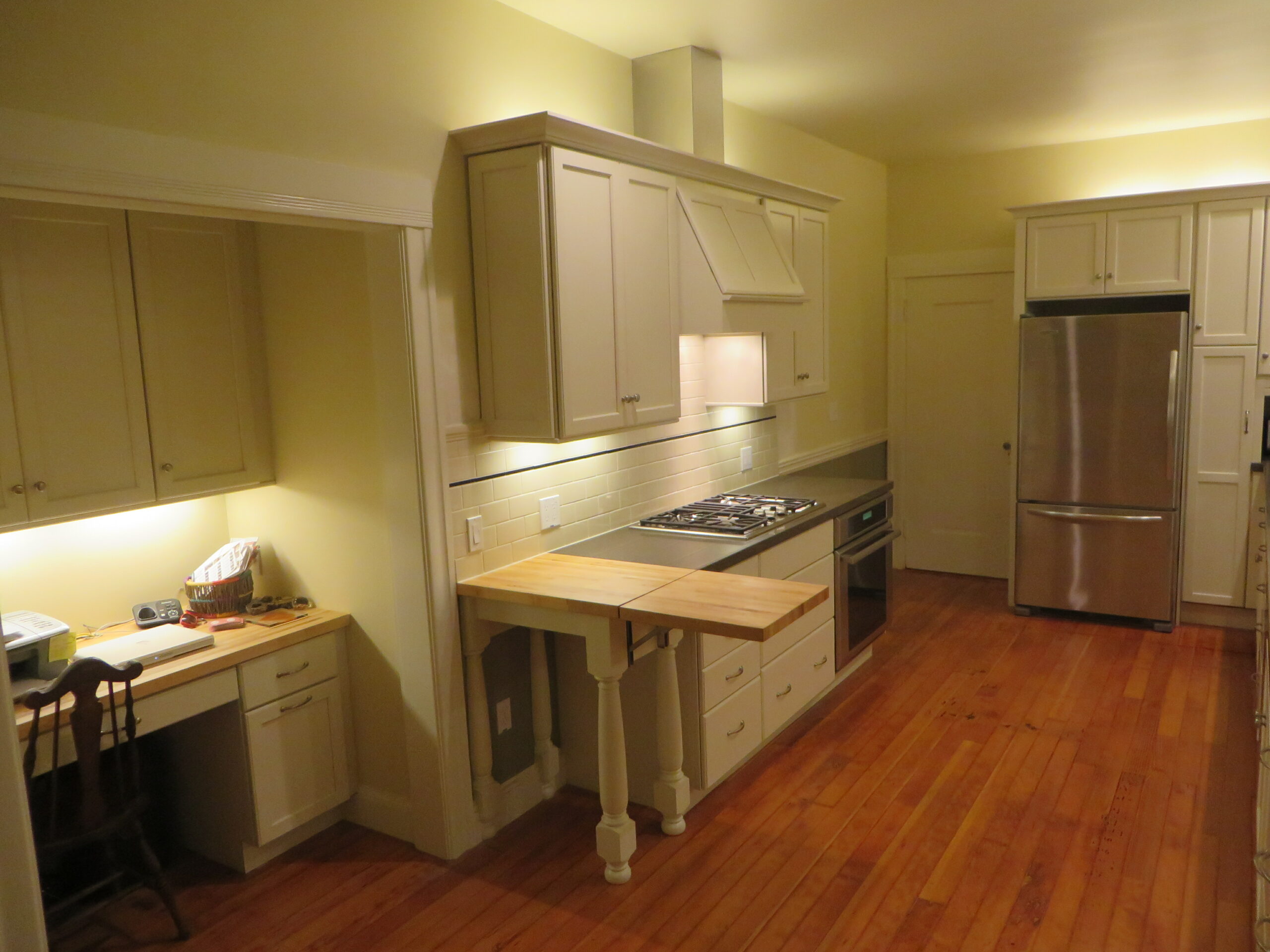 Piedmont kitchen features modern appliances, built-in workspace, expandable counter, and layout ideal for renovation projects.