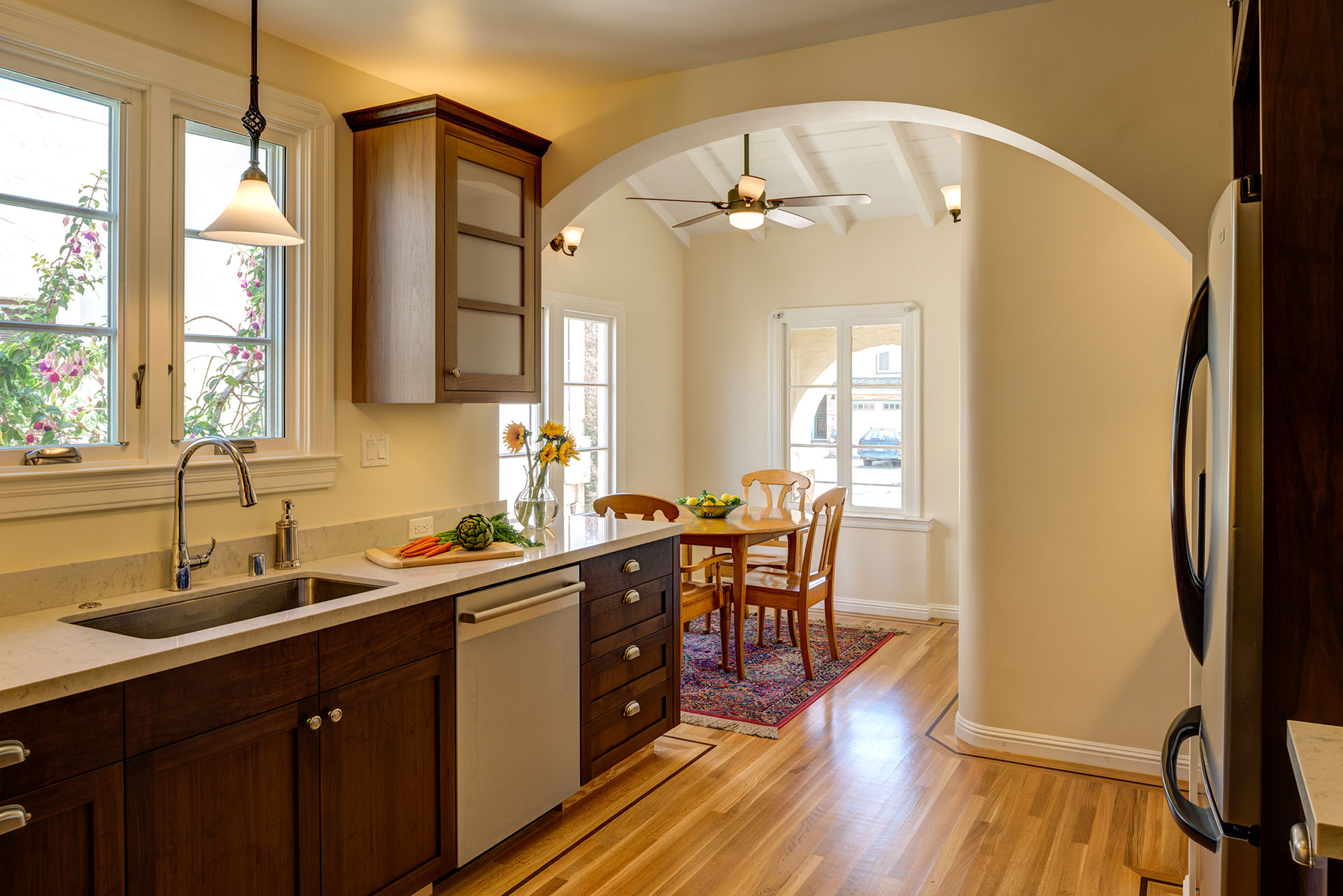 A San Leandro kitchen remodel with upgraded cabinetry, modern appliances, efficient layout, and open flow to a well-lit dining area.