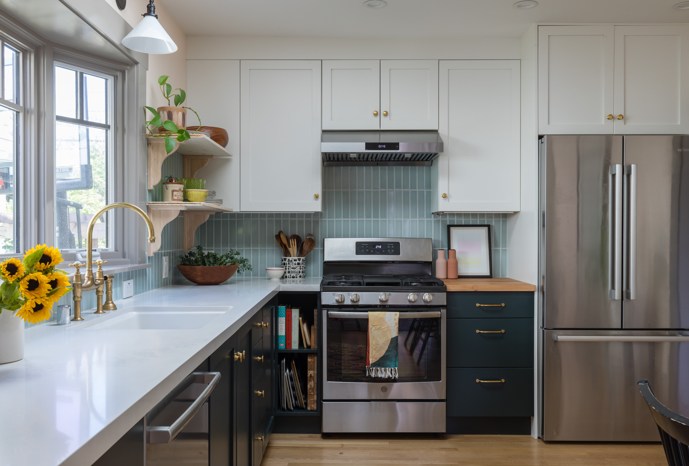 Modern West Berkeley kitchen featuring updated appliances, functional open shelving, generous natural light, and efficient layout.