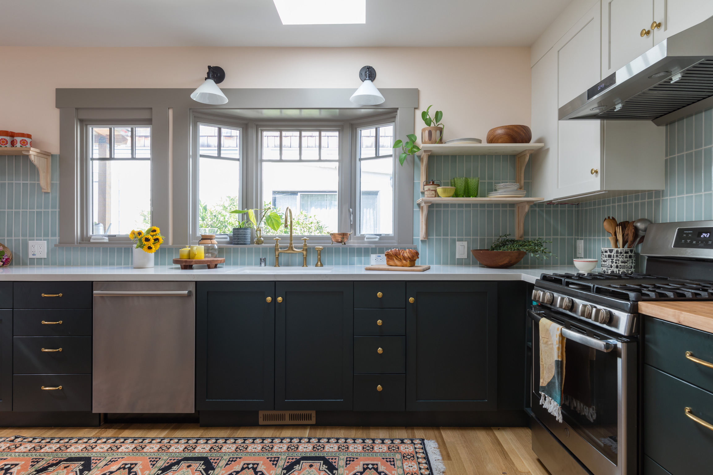 Modern West Berkeley Kitchen with updated cabinetry, energy-efficient appliances, ample natural light, and open shelving.